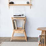 record table with records and turntable