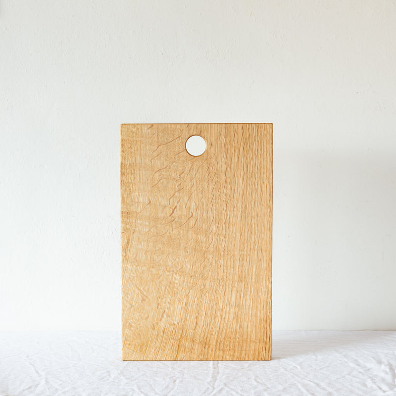 simple oak serving board with hanging hole